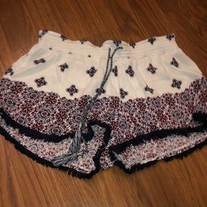 white, red and blue shorts